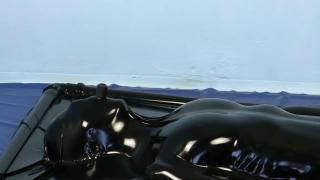 Airtight latex vacbed for vacuum bondage 固定在真空床中的女子