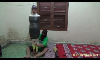 A Beautiful Girl in 3 Layer Mummification  萌妹子的三层木乃伊<br>A beautiful girl is wrapped mummification with 3 layers, the first is plastic, the second is white tape, the third is a strong layer of black tape.<br>http://demonproduction.com/shop/a-beautiful-girl-in-3-layer-mummification/