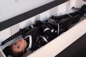 Latex Boxed Morgan tightly bound in latex straightjacket is then lined in the box