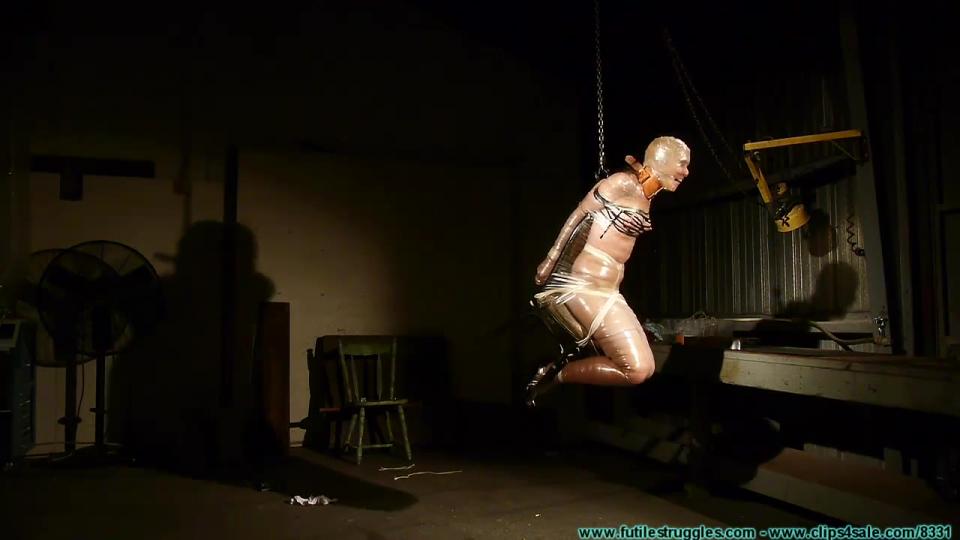 FutileStruggles.Rachels.Mummified.Chair.Suspension-Part.3.XXX.720p.MP4-hUSHhUSH 购买地址：http://www.futilestruggles.com/trial/gallery.php?id=1055&type=vids&<br>Added 08/22/2017		Avg Rating: 5.0<br>This Clip starts where Part 2 ended... Rachel thrashes around a bit and tries to adjust to all of the new pressure and strain from being suspended. I offer no help as I tape her arms together completely, including her hands. I give her a shove and watch her spin in mid air. I think it would be better if she were a little higher off the ground, so using the hoist, I raise her. Before leaving, I giver her another spin. The lights soon go out and it looks like this is how Rachel will be spending the night. I added a little behind the scenes footage at the end of the clip.