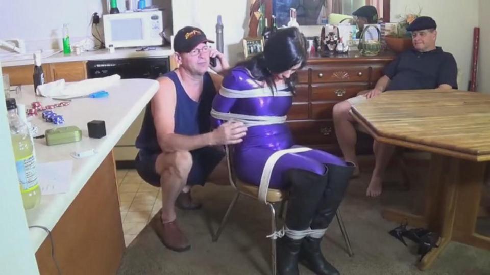 TO THE WINNER GO......QUICKTIME Purple Avenger ( Beautiful Anna Oksana ) has already been captured & is chair tied & ball gagged. Seems the 2 bad guys got hired by Pimp Daddy to capture her. HOW? They left a box full of kittens to get her attention. Then she was clubbed & sleepy clothed. She wakes to find herself in their hide out waiting for Pimp Daddy to get her. HE'S BUSY SO HOLD ON TO HER! The 2 bad guys decide to play poker to see who gets to have her first. Pimp Daddy wanted her clean but they will use her & hose her down. So the card game begins to see who gets her first. SHE GAG TALKS & IS VERY DEFIANT. She is distracting them. How about we put a vibrator on her pussy? THEY DO & PLAY CARDS. She tries to resist her sexual urges. They play cards & talk about screwing her. <br><br>https://www.clips4sale.com/studio/23551/16462824/TO THE WINNER GO......QUICKTIME#!TO-THE-WINNER-GO------QUICKTIME