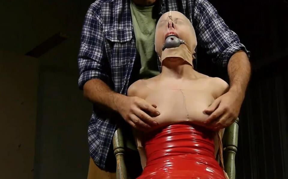 Mummification Hogtie For Rachel - Part 2 Mummification Hogtie For Rachel - Part 2<br>https://www.clips4sale.com/studio/8331/17972002/Mummification Hogtie For Rachel - Part 2<br>This Clip starts where Part 1 ended... Rachel waits for what is to come next as I enjoy the view. Rachel stands with her legs spread as she gently gyrates her hips. I use her tit as a handle so I can control and maneuver her as I smack her nylon clad ass. I make her turn around and order her to keep her legs spread. She looks good bound in hose and nylons. I'm in no rush, so I enjoy the view for a short while, before I start taping her up. I start just under her tits and work my way down to her knees, before I let her take a seat. I finish taping up her legs and feet. I rubber ball with a nylon strap is tightly tied in her mouth right over her cleave gag. Rachel is then nose hooked. This is where Part 2 ends.