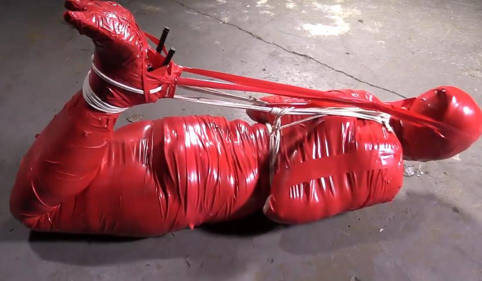 Mummification Hogtie For Rachel - Part 3&amp;4 Mummification Hogtie For Rachel - Part 3&4<br>https://www.clips4sale.com/studio/8331/17972228/Mummification Hogtie For Rachel - Part 3<br>https://www.clips4sale.com/studio/8331/17982716/Mummification Hogtie For Rachel - Part 4<br>This Clip starts where Part 2 ended... I let Rachel adjust for a while. She moans and whimpers as I take a break. I tape up her head when I return. I then untie her elbows and bind her arms in a reverse prayer position before mummifying her upper body. Once done, I lift her out of her chair and place her on her stomach, on the floor. I then hogtie her with rope, after taping up a few places where the tape separated. Her head is then taped back to her feet. I probably could have gone a little tighter here, but I did not want to limit her breathing too much. This sis where Part 3 ends.<br>This Clip starts where Part 3 ended... At first, I don't think Rachel will last long, mummified in a hogtie, but she soon finds a groove and settles in with her breathing. I leave her alone for a while, but I am not done with her. I return, and tie a length of rope to the rope that has her hogtied, and then I pull it vertically and tie it off to the overhead hoist. Rachel's bondage just got much tighter. I then clover clamp her nipples. I tie a length of twine to them and tie them off to a d-ring bolted to the floor. Her whimpers start to intensify again. Finally, I tie another rope to her ankles and pull it back and tie it off to the wall. When I do this, Rachel is pulled back, which really tightens her nipple clamps. I once again leave her to endure her bondage. At the end of the clip I have left in a few minutes of her being released.<br>Clip is actually 29 minutes and 5 seconds in duration