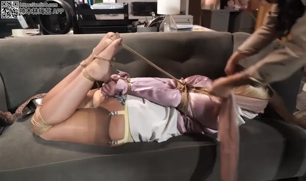 Satin clad secretary tied up against her will Satin clad secretary tied up against her will<br>http://borntobebound.com/updates/?p=42572<br>Constance is at her desk and hears a loud noise, she gets up to investigate it and POOF, she finds herself in bondage on the office sofa. When she realizes what is happening she gets up in her tall leopard heels and tries to hop/ shimmy behind her desk to the phone but she is met by the woman that tied her up and walked back to the couch by her hair. Her gag is removed, panties spit out only to be put right back in. Her head is sealed with tape. More ropes go over her pretty lavender blouse and fully fashioned stockings. She is tied to the couch and left for a bit before being put into a snug hogtie with white cotton added to her gag, her toes tied over her silky stockings and finally the silk sash she was wearing around her waist is added as a blindfold.<br>