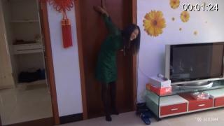 hanged on the door featuring: green dress, black panty hose, hanged on the door