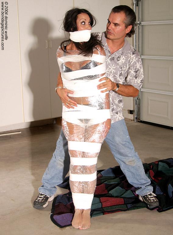 DW-10 I+J - Mummification If you like your ladies tightly wrapped up from ankles to shoulders to the point to where all they can do is wriggle and squirm and try to scream or talk through their packed mouths trying desperately and defiantly to find any means of escape then mummification is the video for you. <br><span style='color:#b0b0b0;'>[隐藏文字，购买后可见]</span>
