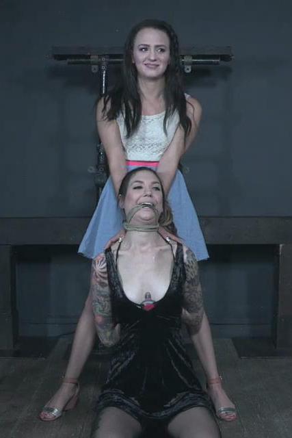 Rockys Road Part 1  Rocky Emerson Rocky is nervous at the start of her livefeed. She admits this while she's being tied up. Her arm is pulled sharply up into her back and then her head is pulled back to meet it. The ropes go through her mouth. Then her other arm is pulled up to the other side. Alex watches on in terrified amusement.<br><br>Alex is tied around Rocky's neck so that the two are held tightly together. After a few minutes Rocky's predicament begins to make her drool. The saliva pours out of her mouth and down her chest.<br><br><span style='color:#b0b0b0;'>[隐藏文字，购买后可见]</span>