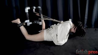 Tegan’s Straitjacket Bondage Orgasms Let’s see how cocky that mischievous dolly Tegan Tate can be when she’s restrained on her belly in a straitjacket, her struggling naked legs tethered by cuffs to a bondage frame! Violet October comes in, smacks Tegan’s tush, and then tickles the bottoms of her bare feet. Tegan seems to like it fine, even as Violet pulls her head up by the hair. “You’re cute when you’re in pain, so I’m going to be mean,” Violet announces, but she really doesn’t seem too stern as she plays with Tegan’s crotch through her panties and gives the brunette some squealing pleasure. Then it’s time for the buzzing Hitachi wand and Violet puts its head down at the bondage sweetie’s helpless hole, getting Tegan giggling and gasping, clearly delighted to be at the mercy of such an attentive meanie. One bondage orgasm follows the other as we see Tegan’s face in all sorts of sexy expressions as her pussy goes over the top! 