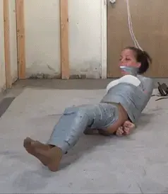 It's Tape time Michelle was over due for a tape mummification. Michelle stands, dressed in top, shirt and heels, Tape gagged, hands tied and hair tied to the rafters. I enter and begin taping her from bottom to top. I lay her on the floor, keeping her hair tied to the rafters, When she manages to get in a sitting position...I take up the slack in the rope keeping her in her butt. Last I stand her up again and neck tie her......and finish the tape mummification.<br><br><span style='color:#b0b0b0;'>[隐藏文字，购买后可见]</span>