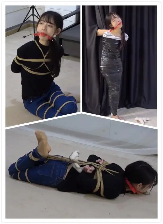 美束映画定拍 魔法玩偶  合集 那是一个会魔法的玩偶，小A下班回家后按照往常一样躺在沙发上玩着手机，全然没有发现自己的身边多了一个玩偶<br>而等她有反应时，是忽然发现自己的双腿莫名其妙的并拢在了一起并且无法分开了，也就在那瞬间，凭空出现的绳索捆绑住了她的双腿，开始是脚，接着是膝盖，几秒钟内她的双腿竟是被数道绳索捆绑在了一起<br>小A慌张不已，赶紧跳着去找剪刀，结果这绳索怎么剪不断？她想要再尝试一次，可刚刚那身不由己，好似有一股无形的力量在控制着她<br>她的双臂也不由自主的反剪到了背后，如双腿一样，被绳索反绑了起来。<br>接着玩偶出现在了面前，这下小A终于知道奇怪事情发生的原因了，可现在也来不及了，她被绳索绑的跑不掉了<br>她努力挣扎着，而随着她的挣扎，捆在她身上的绳索也越来越多，最后竟是将她驷马捆缚起来。逃脱了上次玩具的魔法后，小A这一次想要快速逃离，不料这玩具的魔法再一次的发动了。<br>这一次她又感觉到自己的身体不受控制了，而这一次捆绑她的不是绳索，而是保鲜膜，小A的全身都被保鲜膜缠了个结实<br>她努力的拿到了剪刀，好不容易挣脱了一点，结果又从自己的双腿开始，又被一卷黑色的胶带慢慢的捆了上来，最后又被黑色胶带把自己全身捆了个遍。<br>小A努力的想要跳着逃跑，却不知为何自己被怪力弄到了一个柱子上，最终小A逃脱失败，被玩具的魔法用胶带捆在柱子上，苦苦挣扎