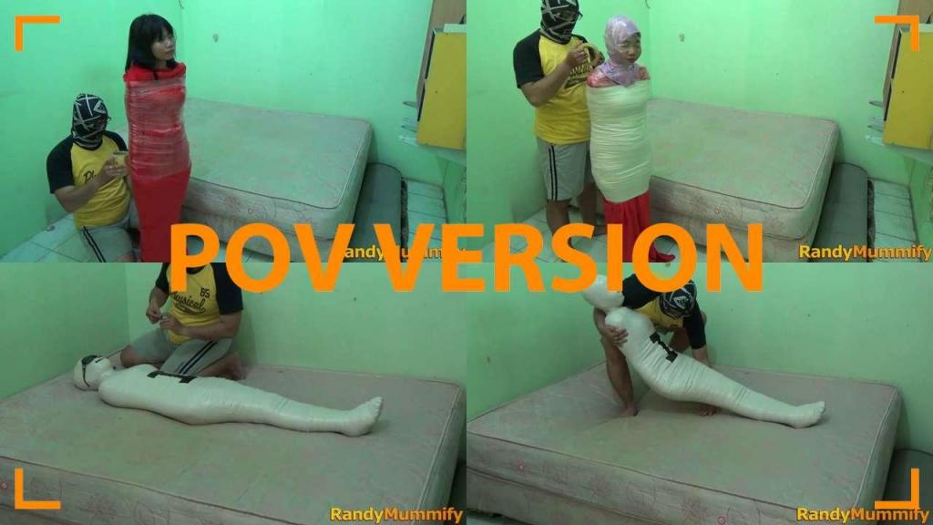 [POV] Main Scene Of RandyMummify RM058 A girl is mummified in the bedroom in a helpless state.<br>This girl's body was wrapped in a red blanket then wrapped again with white duct tape all over her body until she was helpless.