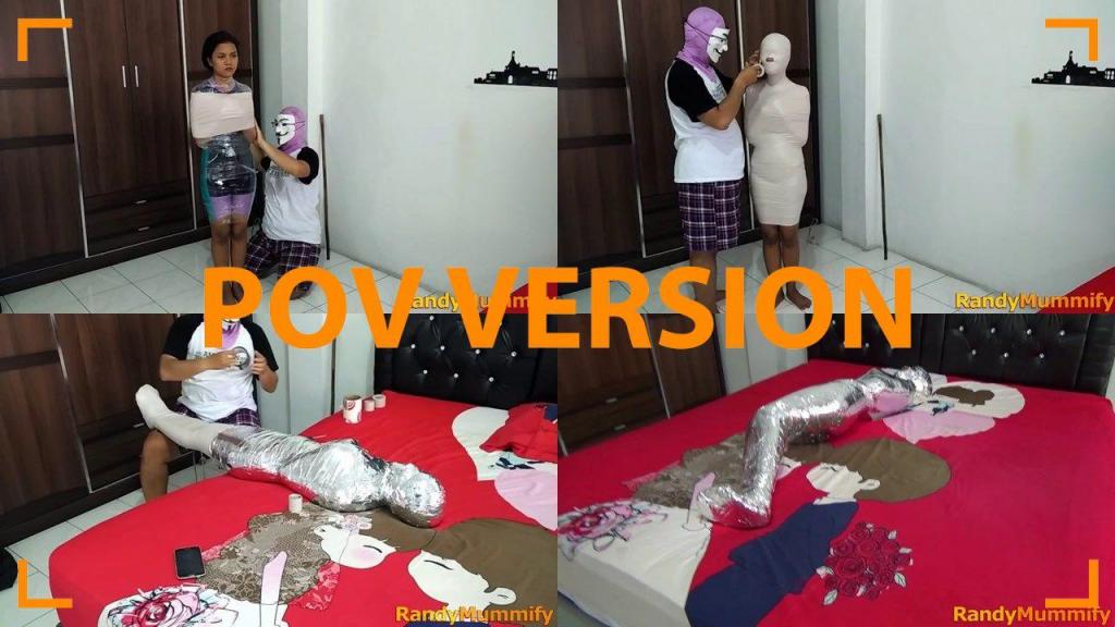 [POV] Main Scene Of RandyMummify RM068 A beautiful girl is mummified in a hotel room to resemble an Oscar trophy.<br>This girl's body was first wrapped in white duct tape and then again with chrome duct tape.