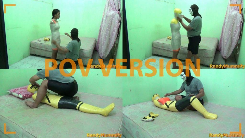 [POV] Main Scene Of RandyMummify RM082 A beautiful and sexy girl mummified in her bedroom with layers of duct tape.<br>This girl's body was wrapped in 2 colors of duct tape and made her body hard to stifle and looked like a Yellow Power Ranger