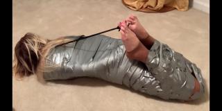 Payday Rosey Satin is challenged to an escape from a duct tape mummification.  She is teased and tormented as she cannot escape and left to struggle.  Will she ever get out?<br>https://www.clips4sale.com/studio/111172/20716083/payday-hd-mp4