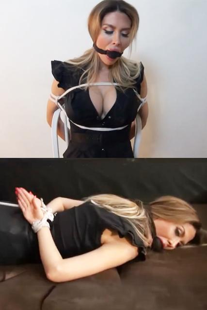 Miranda in Superbound Corporate Compilation Miranda does a little b&e at the behest of her boss in order to gain some corporate secrets. She looks around the place bending over (which offers one helluva view!) at times until she finds the flash-drive she was looking for. It goes into her ample cleavage (usually a safe place to hide things for her!) as she moves towards the exit, but is stopped by a masked man! Some fast talking doesn't get her anywhere, but he is happy to take the flash-drive from her since he wasn't able to find it on his own. Noticing how beautiful she is he has a hard time focusing on the business at hand. He orders to sit down in a chair where her wrists are bound with her palms out, leaving her hands useless. Her ankles are bound under the chair and then her boobs get some breast bondage as well. Finally comes a make-shift cleave-ballgag with a ball inside the cloth that stretches her mouth wide apart, much to her dismay! Her huge breasts are groped as the perverted masked man can't control himself and inappropriately touches her all over. <br><span style='color:#b0b0b0;'>[隐藏文字，购买后可见]</span>