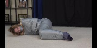 Jayme mummified In this custom video Jayme is first strapped in a straight jacket. Then Jayme while wearing yoga pants and socks is mummified in tape. Jayme also gagged with tape wrapped around her head making sure she is completely quiet. Jayme is then left to struggle with really no chance of escape. Jayme starts struggling on her feet but soon she falls to the ground and continues her struggles. Dont miss this hot clip featuring the beautiful Jayme. <br>https://www.clips4sale.com/studio/26972/22157975/jayme-mummified-mp4