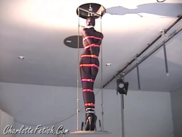 The Arrival II <br><br>This week I have put the video to this update live as well as the pictures!! Enjoy!!!<br><br>I am cocooned in the Darlex suit and arm sheath. The ballet boots which traveled along in the crate are put on me and then clamped into the bottom portion of the silo device. A thick metal collar is locked around my neck and locked into position for my height. I can not move much. To add to the situation several straps are cinched tight around my body which ensures that I can not move. Then I am lifted into the silo for my stay up there. There is a distinct noise coming from the dark tube overhead where I will be stored. I am quickly inside the silo where I will stay for at least a while. 地址图片里 <span style='color:#b0b0b0;'>[隐藏文字，购买后可见]</span>