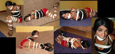 Hollywood October First October..lets start this month off right. Hollywood is tied in hundreds of feet of rope.Gagged with a ball wrapped in cloth.Dressed in a black top.red skin tight shirt heels and hose.Hollywood wakes up to find herself tightly tied and gagged with no memory of what happened or how she got here? Hollywood tries to sit up but she is so tightly tied she can only roll over.Eventually Hollywood rocks herself back and forth and sits up. But she is next hogtied and left on the floor Hollywood is pushed to her limit in this one. Happy October.<br>(Bonus clips - Hollywoods time on the couch, Isabel chair tied and ball gagged)<br><br><span style='color:#b0b0b0;'>[隐藏文字，购买后可见]</span>