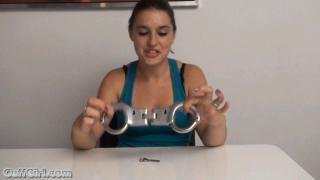 cg009 Women handcuff themselves