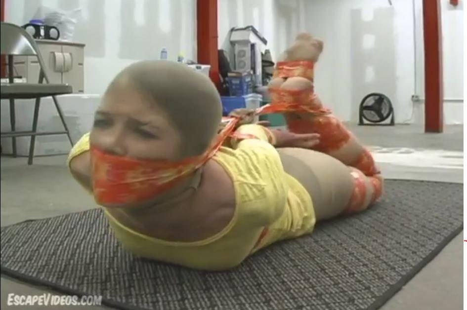 Autumn Pantyhose Hooded and Hogtaped! Autumn Pantyhose Hooded and Hogtaped!. Slender, seductive cutie Autumn gets bound and gagged with tape in our latest bondage video featuring a pantyhose hood! Look at this slim, beautiful girl. All she has on is a pair of panties, a pair of pantyhose and a tight top. Her captor decided to break out a roll of tape and use it to bind up her body, taping her legs together in four places, pinning her elbows together behind her back and sealing her mouth shut so she can't scream.<span style='color:#b0b0b0;'>[隐藏文字，购买后可见]</span>