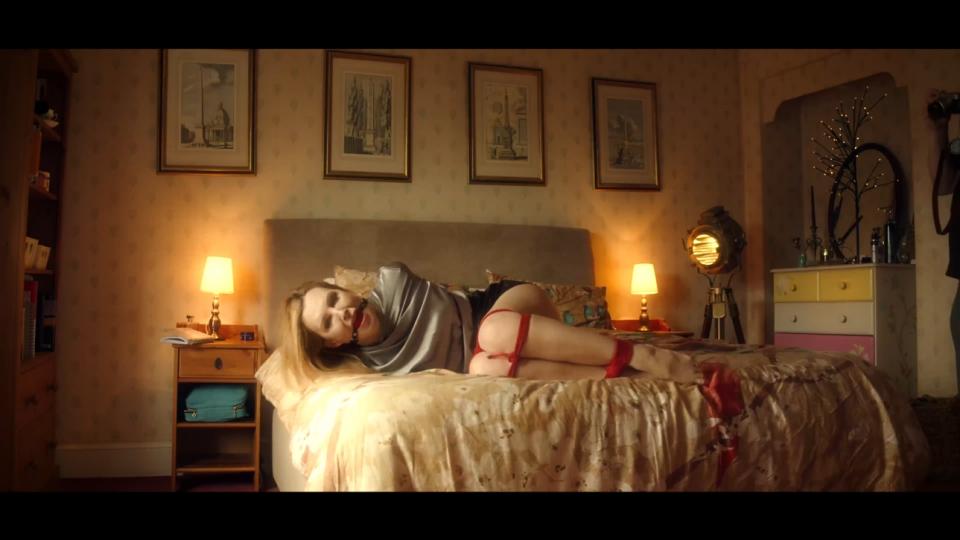 VID0619: Ariel Anderssen Captured Blackmailer Beautiful blonde femme fatale Ariel Anderssen has had a tip-off that a celeb is holed up in a remote country hotel<br><br>having a torrid knee-trembling affair! The potential for blackmail must be huge! Ariel sneaks up to spy on the couple<br><br>with her camera to snap shots - pay up or the pics get posted! But her greed overcomes her caution as she follows<br><br>them into the hotel - they spot her! They leap upon her and she finds out exactly what sort of kinky sex they have<br><br>been having... the room is full of bondage and BDSM equipment. She is soon tied from top to toe in inescapable hemp<br><br>rope bondage over her sexy satin blouse, her protests stilled by a brutal ball-gag in her mouth. And now they turn her<br><br>own camera on her to make her humiliation complete - THEY will be able to blackmail HER!<br><br>Hywel's note - a first experiment with the mild 1.33x squeeze anamorphic Laowa lenses on the Sony FX9. The anamorphic<br><br>character is subtler than the 2x squeeze lenses I have for the GH5, and a lot sharper. I think it gives the film a subtle<br><br>cinematic quality, although I do wish I could provoke them into showing stronger lens flares. A more interesting tool for<br><br>location shoots than for our domestic stuff I think (our house has lots of rooms but none of them especially large, and anamorphics<br><br>often need space to play in).<br><span style='color:#b0b0b0;'>[隐藏文字，购买后可见]</span>