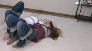 Two girls taped and gagged Two girls taped and gagged