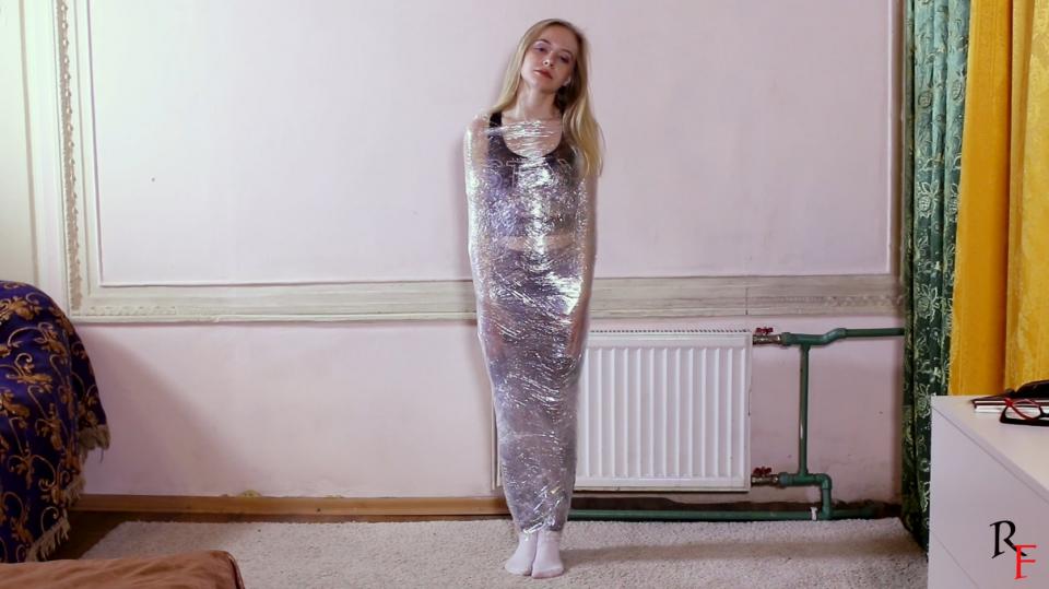 Olesya complete duct tape mummification full hd RF studio production<br>At the first part, Olesya stands wrapped in plastic, without a gag. She looks pretty and poses at the camera.<br>At the second part, Olesya is completely wrapped in black tape over the transparent plastic. Now she’s completely mummified. Also here are two different gags: at first she’s gagged with a tape while her mouth is open, then she keeps her mouth closed and it's also taped.<br>Olesya wears white socks here.<span style='color:#b0b0b0;'>[隐藏文字，购买后可见]</span>