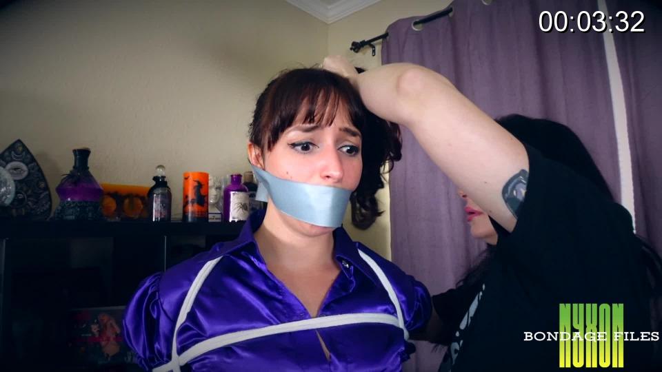 Karly Salinas Prepping For The Big Role Karly is needs to rehearse for an upcoming film, and asks Nyxon to help her. It's a crime thriller, and Karly really wants to do some rehearsing while she's tied up. The scene starts with Karly's upper body already tied & both ladies walking into the room. Nyxon tells her that the script is a little vague, so she'll just improvise a bit. Nyxon takes some panties out of her bag, and shoves them into Karly's mouth. She takes some tape & wraps it around her head sealing the panties in good. Nyxon glances at the script again & comments how it says that Karly's tied up in just her bra & panties. She unbuttons Karly's blouse, and removes her skirt. Next, she adds a tight crotch rope & finally some rope around her ankles and knees. After Nyxon finishes her tie on Karly, she tells her to go ahead & struggle for her director.<br><br><span style='color:#b0b0b0;'>[隐藏文字，购买后可见]</span>