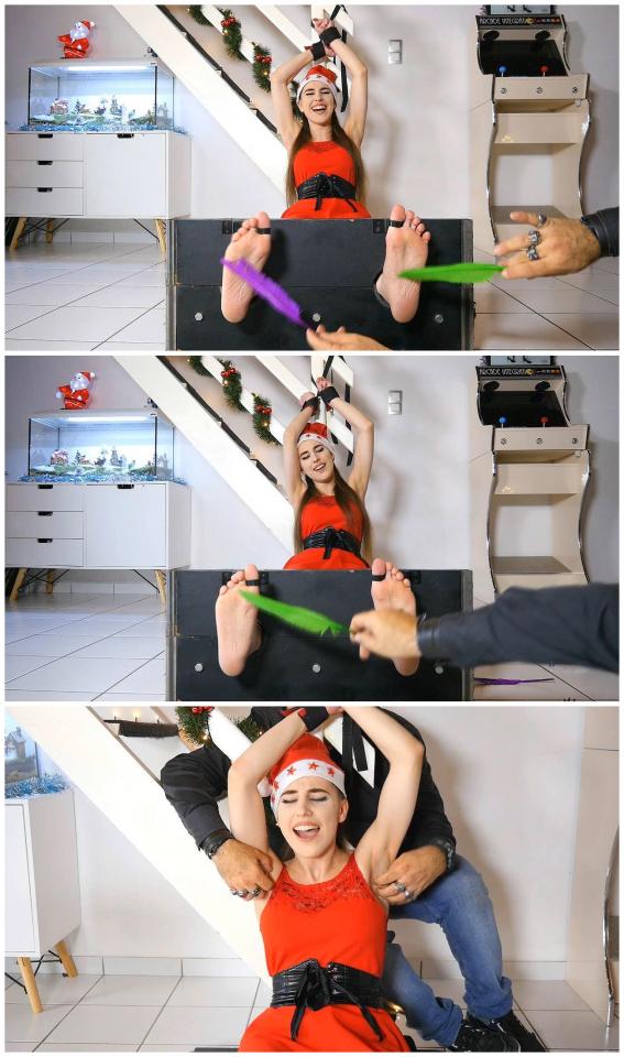 I ASKED FOR AN EXTREMELY TICKLISH GIRL FOR CHRISTMAS : PART 02 - THE STOCKS PUNISHMENT 购买地址<span style='color:#b0b0b0;'>[隐藏文字，购买后可见]</span><br>The fun continues in the stocks with my new Ticklish Christmas Gift.<br>I immobilized her with her arms up and her extremely ticklish bare feet locked for a complete punishment from head to toes.<br>The session is 50% bare feet and 50% upperbody tickling with feathers, fingers and different tickle tools.<br>Santa's beauty is mercilessly tickled with a methodical exploration on her most sensitive spots.<br>She explodes in laughter at each touch of a feather or fingers on her hyper sensitive skin with very arousing reactions.<br>By the way  she's very sensitive to the tongue between her sexy toes.<br>What an incredible Christmas with a true ticklish beauty totally devoted to my tickle fantasies for this exceptional night.