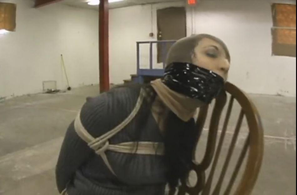 Valerie Bound and Gagged in a Pantyhose Hood Valerie Bound and Gagged in a Pantyhose Hood. Our gorgeous model Valerie ends up in quite a predicament First, she gets bound and gagged in a camo miniskirt, high heels and pantyhose. Then, her captor comes in and slides a pantyhose hood over her head. She also gets a lot of bondage tape wrapped around her head, eyes and mouth. With her senses taken away, she ends up struggle and massively gag-talking while bound and gagged in a wooden chair.<span style='color:#b0b0b0;'>[隐藏文字，购买后可见]</span>