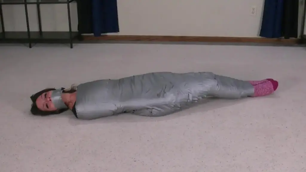 Destiny The Mummy What do you do when you have a bunch of duct tape laying around? Destiny finds out in this custom video. Destiny is wrapped from her ankles to her shoulders with duct tape. A nice wrap around tape gag keeps Destiny quiet and completes the look perfectly. Destiny struggles on her feet before she is placed on the floor so she can roll around for my amusement!