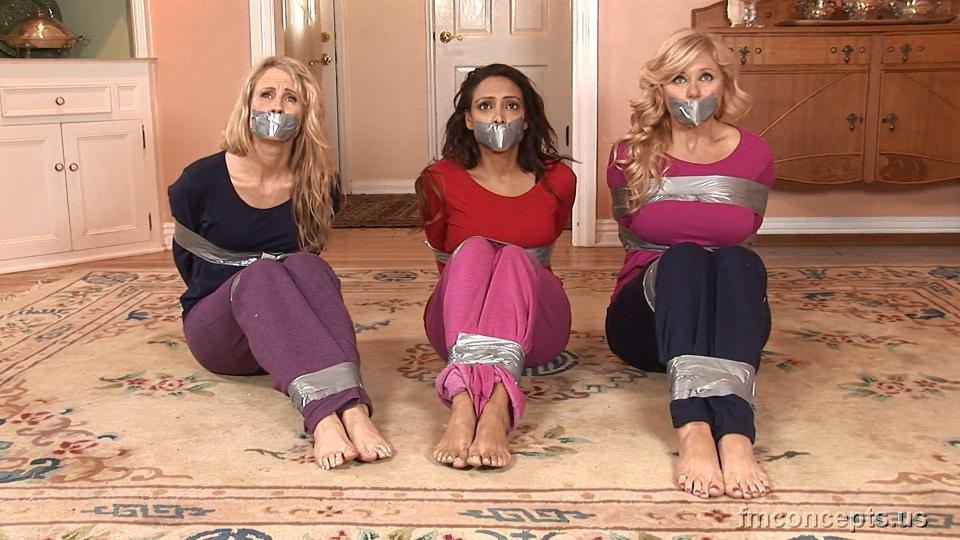 It Was Bizarre - I Found Three Hot MILF's Taped Up on the Floor! Looks like the exercise class came to an abrupt and alarming conclusion for suburban beauties Sherri Reynolds, Marissa Sparks and Nina Monroe, who roll around tape-bound and gagged in their sweats on the floor! <span style='color:#b0b0b0;'>[隐藏文字，购买后可见]</span>