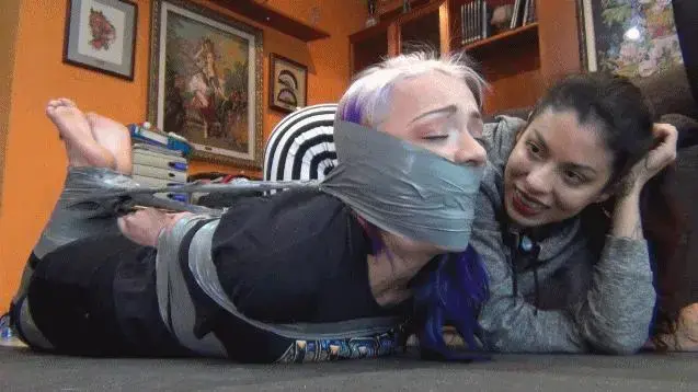 Flea tied up and gagged! (MP4 HD) Flea loves going to parties and meeting new boys. She's been texting with a boy she met a few days ago. But, from all the boys in the world, she had to pick Liricaa's boyfriend. That's really bad luck. Liricaa has a way to deal with girls who want to steal her boyfriend we all know. She makes them dissapear. So she waits her on her house and assaults her. “Who are you! What are you.... MMMMMMMMMMMMMPPPPPPPPPPPPPPPPPHHHHHHHHH!!!!!!!!!”. Liricaa ties her hands with tape and handgags her. “You're not stealing my boy, bitch”. She gags Flea with her socks and a huge tape gag. Then she ties her really tight! Now, Liricaa doesn't have to worry about Flea stealing any boyfriend. She's gonna be there for a while! “MMMMMMMMMMMMMMMPPPPPPPPPPPPPPPPPHHHHHHHHHHH!!!!!!”.<br><br><span style='color:#b0b0b0;'>[隐藏文字，购买后可见]</span>