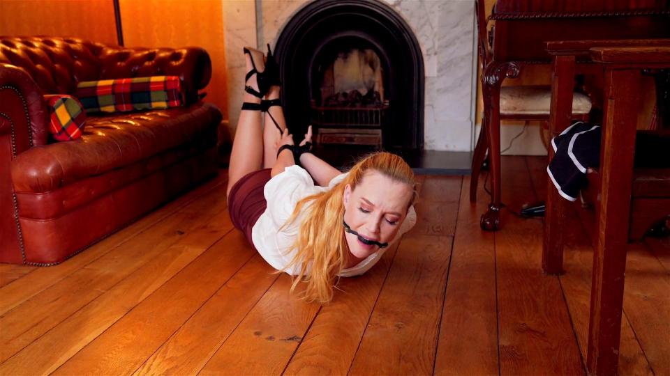 Cuffed, Tied &amp; Gagged By Intruder   Ariel Anderssen (this is the full length version of a series I've recently published. The 3 parts are called Cuffed by Intruder, Chairtied by Intruder & Gagged & Hogtied by Intruder.  Buying this version works out as better value if you want the entire story). I'm quietly sitting sewing in my drawing room, dressed in high strappy heels, skater skirt and white blouse, when a man bursts in and takes me quite unawares! At first, I think he must be the police, since he immediately slaps a pair of handcuffs onto my wrists, fastening my hands behind my back.  However, he's not in uniform, and when he leaves to search the house, I wonder if he's a burglar? Or perhaps something to do with the military? Unsure what to do, I try to escape the cuffs in a variety of ways. It's hopeless, they won't budge. It occurs to me to try to get out of the house, but what on earth would the neighbours say if they saw me in the street, in my high heels, short skirt and handcuffs? It'd be a scandal. Undecided and nervous, I stay in the room, anxiously trying to escape the cuffs, and anticipating what might happen next... ...the man comes back, and uncuffs me, but just as I'm gratefully hoping that he'll leave, he grabs me again, makes me change out of my skater skirt and into a scandalously short, tight one, and ties me tightly to my own office chair, with rope around my waist, ankles and wrists, and my wrist rope and ankle rope connected so that I can't hope to escape. He leaves me to look around the house again (I'm now convinced that he's a burglar), so I do my very best to reach the knots and escape the bonds. But it's hopeless! I keep struggling, hoping to somehow loosen the ropes. But I have no luck, and he's soon back again, with plans to bind me even more thoroughly and make his escape... The monster! He's tied me on the floor, in a horrible, tight hogtie. Not only that, but he's gagged me with a big rubber ball, so I can't even argue with him when he tells me he's leaving me like this. I struggle uselessly, rolling occasionally onto one side or the other but incapable of making any headway with actual escaping.  What a beastly man!<br><span style='color:#b0b0b0;'>[隐藏文字，购买后可见]</span>