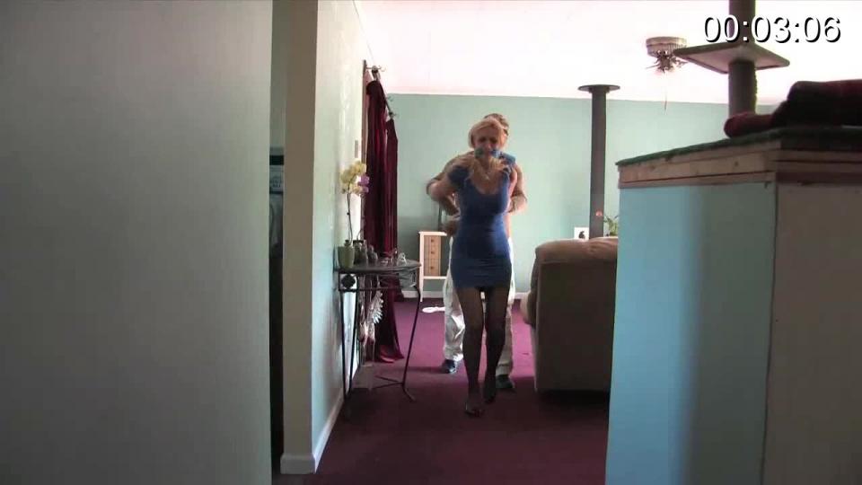 Blackmailer From: Beauties in Bondage (3305 Clips)<br> <br>Description:<br><br>Madison has been blackmailing her ex-husband and he has finally had enough. He hires a fixer to retrieve the incriminating documents. The fixer sneaks into Madison's home and surprises her, clamping a hand over her mouth. He demands the documents she has been using for blackmail, and when she says she doesn't know what he is talking out, the fixer pushes her up against the wall and ties her wrists together behind her back. He gags Madison and then walks her from room to room as he searches the house. Having failed to find the documents, he decides to scare Madison into giving them up. He ties more rope to her wrists and secures it around her waist, then uses this as a leash to walk her up and road and into the woods where he ties her to a tree. He says he will leave her alone in the woods all night if she doesn't tell him where to find the papers. Madison relents and tells him they are hidden in a safe. She gives him the combination and he goes off to see if she is telling the truth. Madison struggles with her bonds while the fixer is absent but she can't get free. After a while, he returns and frees her from the tree, having found the documents exactly where she said they would be. He marches her back to the house, her wrists still bound, a gag still in her mouth. Back in her living room, he makes her get down on the floor. The rope used as a leash is now secured to her ankles, placing her in a hogtie. The fixer says he is going to leave her like this all night as punishment for not cooperating right away, then he departs.<br><span style='color:#b0b0b0;'>[隐藏文字，购买后可见]</span>