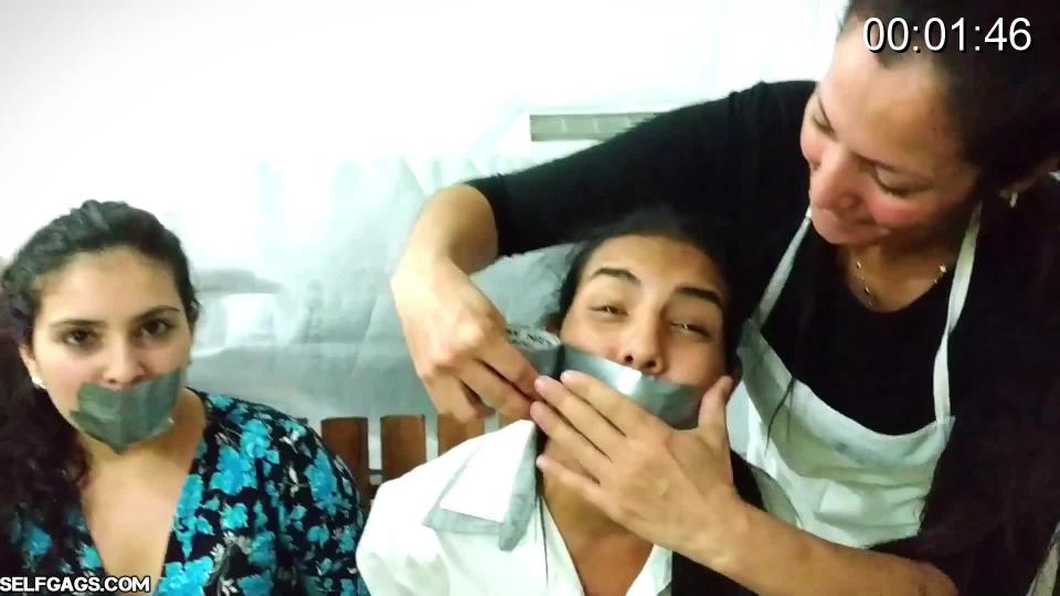 Laura, Katherine &amp; Maria Martinez in- Step-Mommy's Little Princesses- Gagged With Each Othe Sweet sexy step-sisters Katherine and Maria Martinez are already bound and lightly gagged when their step-mom, Laura, comes in. Laura removes the shoes and smelly socks from each of her tied up daughters and uses the socks from each girl as a muffling mouth-filling stuffing for the other. Maria and Katherine each get each other's nasty socks wrapped into their moaning mouths with sticky duct tape going all the way around their heads until they've both been gagged tight. <br><br>Both girls are now barefoot and put in the perfect position for their step-mom to perform a thorough foot worship mouth cleaning of their stinky feet - and you'll be surprised to see how wild that foot worshipping step-mom can be with her mouth!<br><br><span style='color:#b0b0b0;'>[隐藏文字，购买后可见]</span>