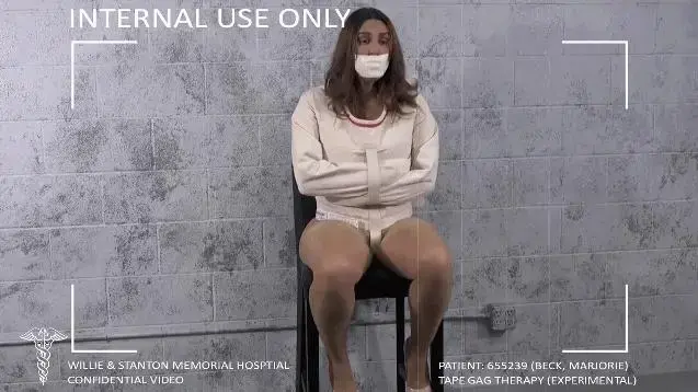 Gagged Girls Stories: Tape Gag Therapy: No Escape (starring Megan Jones) Doctor Megan Jones is called in for a consult.  It seems one of the psychiatric wing's more troublesome patients is having delusions and Megan's colleague needs her help to handle things.  What Megan doesn't know is that she is being set up.  The "patient" in question believes she is a doctor and when Megan shows up, she finds herself immediately bound and gagged and subjected to Dr. Smith's Tape Gag Therapy!  Now Megan has become the patient and she finds that once she is locked in a straitjacket and her mouth is taped shut, there truly is no escape!<br><br><span style='color:#b0b0b0;'>[隐藏文字，购买后可见]</span>