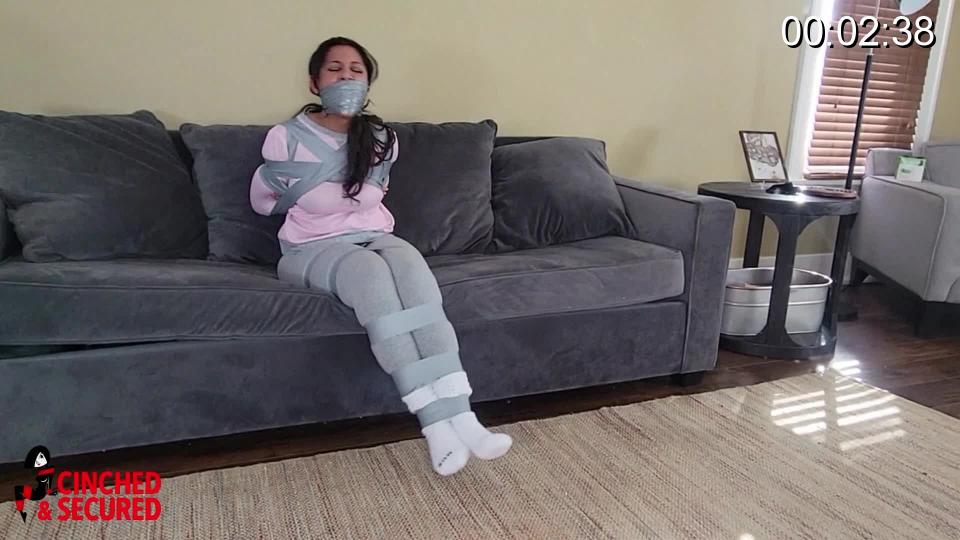 Calisa Bliss - Taped In Her Pajamas! Calisa had a big audition and all submissions were to be submitted via video.  She excitedly called her friend to help and asked him if he would mind coming over and taping her.  He eagerly agreed, but as Calisa soon learned, the two had some misunderstandings that needed to be worked out. Her friend thought she wanted to be bound and gagged with tape, and he wasn't about to give up that opportunity, no matter what! As she protested, he packed her mouth and taped it shut, sealing it beneath layer after layer of tight tape!  The poor girl thought her head was going to burst!!  Hopping about the room and grunting angrily beneath her gag, she did everything she could think of to free herself, but her friend had been VERY thorough, and escape was impossible! Concerned for Calisa's safety, her friend decided to hogtie her in tape so that she could not hop and accidentally hurt herself! Now flopping like a fish on the floor, the girl struggled in useless impotent anger, knowing that not only would she not get free, she'd probably lose out on the role to boot!<br><br><span style='color:#b0b0b0;'>[隐藏文字，购买后可见]</span>