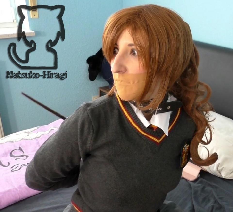 Rachel is not ready for Hogwarts Original Damsel: Rachel (Our Harry Potter OC)<br><br>The model is over 21. Dont post or upload our video some where else or we´ll go for legal consequences!<br><br>Its the time of Halloween and our young Blogger Rachel is preparing herself for a nice Halloween party! But there is one important question left for our cute little blogger girl... Wich costume should she wear for Halloween... Well there is a well known school uniform in her closet she wants to wear... But she didnt know that will bring her a lot of trouble... and a lot of views!!!<br><br>Video includes: Tapegag, leather harness, leather bound, belts, rope bound, gag talk, moaning, struggling, magical appearing gag and bindings, hopping around, suspension bondage (first time in one of our videos!), leather hood, socked feet, Rachel, bloppers<br><br>Video Length: 14:12 Minutes