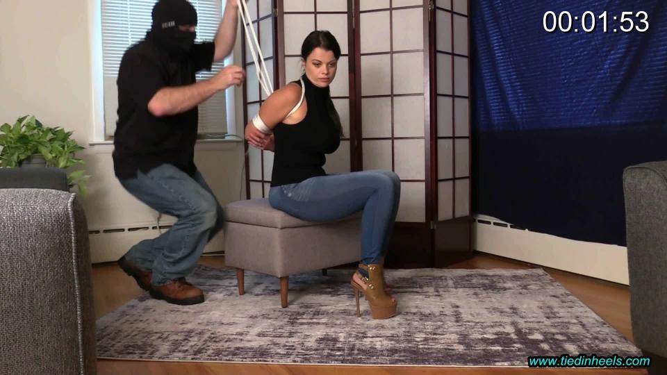 Nadia White Roped Up in Slingback High Heeled Sandals! STUNNING BEAUTY AND SWEETHEART NADIA WHITE ARRIVES DRESSED TO BE TIGHTLY BOUND AND GAGGED! SHE WEARS STILETTO, HIGH HEELED, PLATFORM SLINGBACK SANDALS AND SKINTIGHT JEAN LEGGINGS! IT WAS ONLY A MATTER OF TIME BEFORE I GOT THE TIGHT, WHITE ROPES ON HER LUCIOUS BODY! A HUGE RED BALLGAG GETS BUCKLED DEEP IN HER MOUTH KEEPING HER PROTESTS AND WHIMPERS TO A MINIMUM!  NADIA LOOKS INCREDIBLY SEXY STRUGGLING AROUND IN A TIGHT BOXTIE AND HUGE BALLGAG IN HER MOUTH! SHE NEEDED TO BE IMMOBILIZED FOR GOOD SO SHE WAS ROPED UP INTO A NICE, TIGHT HOGTIE! I think I'M GOING TO KEEP THIS HIGH HEELED BEAUTY AROUND MY COMPOUND FOR A LITTLE BIT LONGER!<br><br><span style='color:#b0b0b0;'>[隐藏文字，购买后可见]</span>