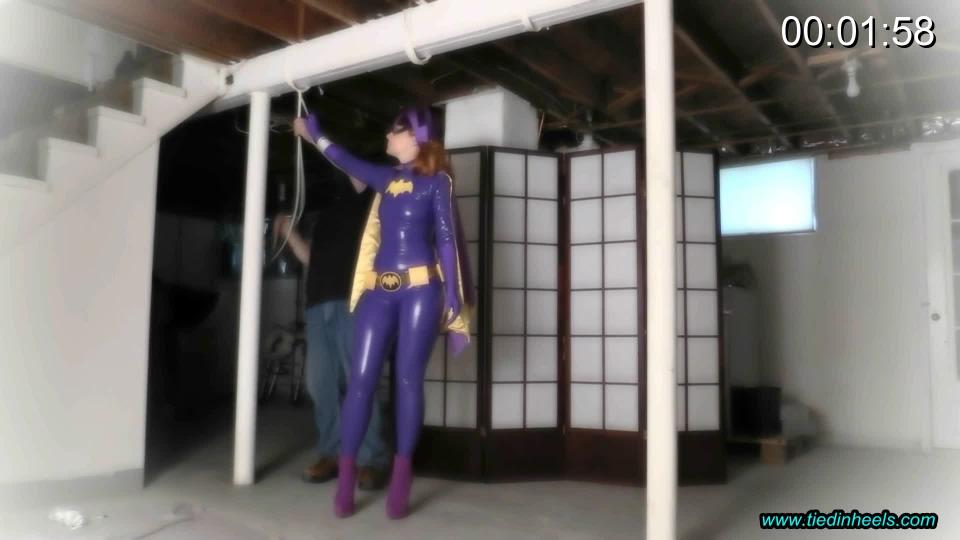 Batgirl Spreadeagle in the Dungeon Lair! sexy doo-gooder batgirl has been captured once again by one of CATWOMAN'S TRUSTY CATCHPAWS! HE BRINGS BATGIRL TO CATWOMANS' DUNGEON LAIR TO SOFTEN HER UP AND KEEP HER IN CAPTIVITY UNTIL CATWOMAN ARRIVES AND FINALLY GETS HER REVENGE ON BATGIRL! BATGIRL LOOKS SOOOOO SEXY AND STUNNING IN HER TIGHT, PURPLE CATSUIT....SHE WAS JUST BEGGING TO BE CAPTURED AND TIED UP AND GAGGED! SHE WEARS HER SEXY HIGH HEELED ANKLE BOOTS AND TRUSTY UTILITY BELT BUT HER GADGETS WILL NOT HELP HER OUT OF HER CURRENT SITUATION! BATGIRL IS STRETCHED OUT TAUT IN A STANDING SPREADEAGLE....SEEMS LIKE BEING STRETCHED OUT IN SIX INCH HIGH HEELED ANKLE BOOTS IS A TOUGH PROPOSITION FOR POOR BATGIRL! SHE IS HELPLESS IN THE TIGHT CATWHISKERS THAT BIND HER...SHE CAN'T STOP CATWOMAN'S CATCHPAW FROM GAGGING HER WITH A TIGHT CLEAVE GAG TO KEEP HER NONSENSE TO A MINIMUM! NOW SHE WILL BE LEFT ALL ALONE TO CONTEMPLATE WHAT CATWOMAN HAS IN STORE FOR HER! BYE, BYE BATGIRL!<br><br><span style='color:#b0b0b0;'>[隐藏文字，购买后可见]</span>