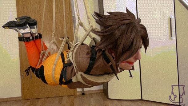 No recall for Tracer Original Damsel: Tracer Classic Skin<br><br>The model is over 21. Dont post or upload our video some where else or we´ll go for legal consequences!<br><br>Tracer returned earlyer from work, since she had a more important goal for today! Overwatch 2 is out and she want to try it! Since she is a member of the famous Overwatch team she got a beta key to test it!<br><br>When she suddenly got a video chat request, but she didnt expected D.Va to call her who asked for some nice PVP matches... Minutes of owning later...<br><br>Tracer wasnt pleased about getting beaten up by D.Va. Tracer was eager to get a rematch but it seems D.Va disapeared!! She had a feeling something isnt right, she decided to get to D.Va's home as soon as possible and see what happened.<br><br>When she arrived at D.Va's home she discovered that D.Va was not there! Was she kidnapped? If so where is she? But she realized way to late that this was a well prepared trap... For herself!<br><br>Video includes: Tapegag, wrap around tapegag, ballgag, rope bound, tied to a suspension, frogtied, suspended, on screen gagging, on screen tieing, shoes, hopping, struggling, moaning, gag talk, chloroform, bloopers<br><br>Video Length: 22:15 Minutes