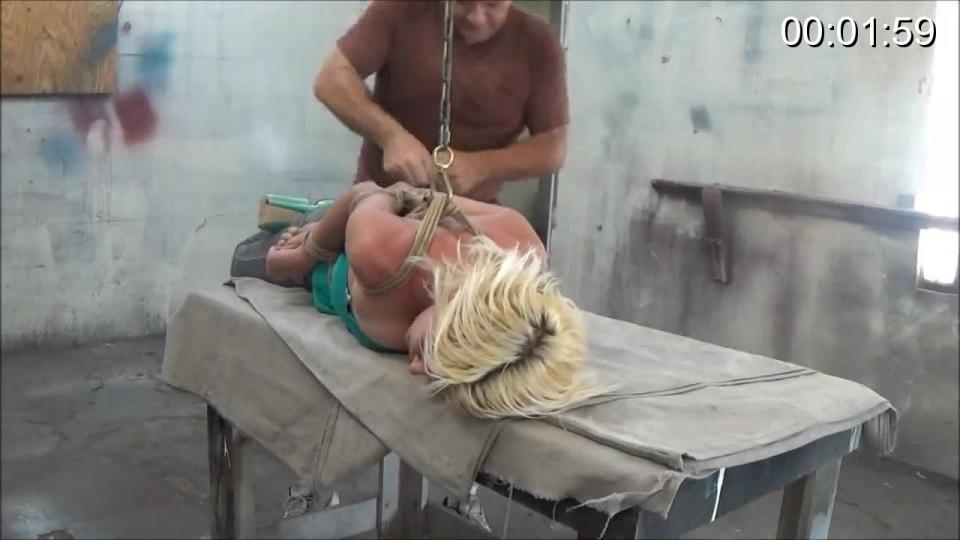 Sidnay Adams Back on the table Sidnay Adams is without a doubt the most animated model I have ever worked with. I Jokingly call her " Psycho Sid ". She is able to put her self in the moment as if These clip were real. In this clip , Sidnay is elbow tied , chicken winged and laid on the table. I walk in and fold her legs, tying her crossed ankles and attaching them to waist rope. Packaging her nice and snug. I reach for my roll of vet wrap and begin to gag Sidnay, She goes Psycho and the clip gets very interesting fast, I leave her to go through her fit. I can see that her gag is too tight and return, cutting it off and replacing it with tape....You can see the craziness in her eyes. I next sit her up...neck tying forward and tying her ankles to the side making her straddle the table. But there is more. Last I tie her head back causing her to go silent, But you can see in her eyes what she is thinking. Sidnay Adams one of a kind.<br><br><span style='color:#b0b0b0;'>[隐藏文字，购买后可见]</span>