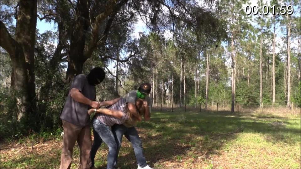 Just Give Up The Combination To The Safe Bitches It was late and the day shift was clocking out. Our bumbling robbers played by Eric Cain and Les await the girls to come to the brake room. They wanted the money in the safe and needed the combination. They grab Brenda first. In a head lock they drag her out to a tree. The kick her ass and rough her up trying to get her to talk. She won't give up anything. They put her in a high strappado and smack her ass. They tell her fine maybe her co worker will tell us. They leave Brenda to struggle and go get Caroline. She is dragged out to the tree and man handle. Brenda starts yelling fine I will give you the combination but there is no money in the safe. The two robbers take the victims down and march them inside. They leave them to check the safe. The bitch was right the money is not there. Mad and frustrated the robbers drag the girls back to the tree and tie them up with there hands over there heads. They grope, knee, and rough up the girls before leaving them there for the night with the bugs. <br><br><span style='color:#b0b0b0;'>[隐藏文字，购买后可见]</span>