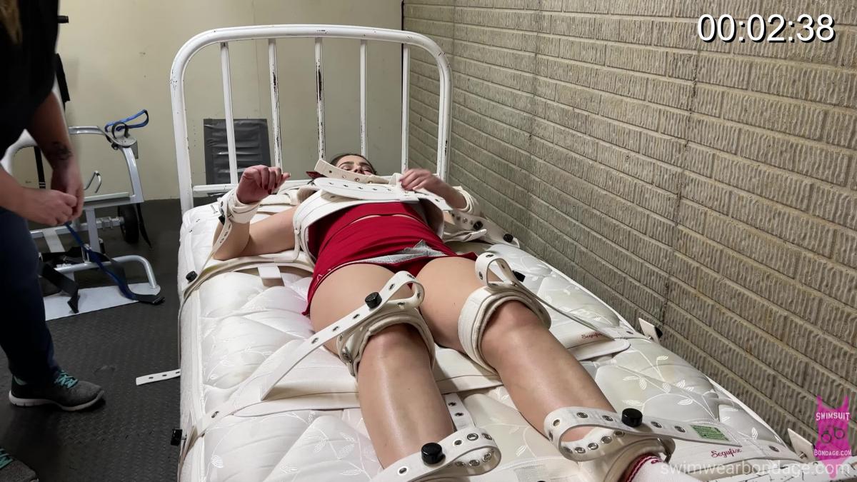 376_Tilly_Segufix Tilly was apprehended by Jess Jordan after cheer practice and she is being strapped into a very inescapable Segufix medical restraint system, before long Jess realizes that Tilly needs an attitude adjustment and begins orgasm tease and denial with a Hitachi magic wand. 