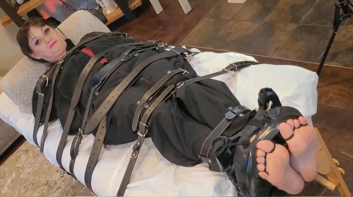 The Tickle Table - Mizz Unique Good Lord this girl has a fantastic laugh! And face! And feet! Oh she's a perfect vic....er....candidate for the table! Therefore, she's sealed in my new bag, strapped up tight, then immobilized further with more straps, and her toes bound back. You know what comes next.<br><br>Not positive she did, but it didn't take long to figure out. At one point she asks for mercy. Pfft. Nah. At another, she comments that being immobilized makes it WORSE. Music to my ears!<br><br>