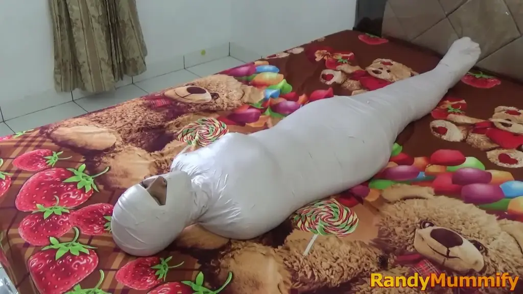 [RM117] Beautiful girl for the first time experience how to be a living mummy A beautiful girl feels for the first time what it is like to be a living mummy wrapped tightly with white duct tape
