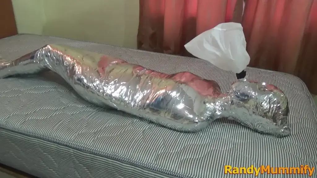 [RM121] Cocoa-Soft Collaboration: Girl 150 cm mummified with 2 layers of tape and breathes from tube [RM121] Cocoa-Soft Collaboration: Girl 150 cm mummified with 2 layers of tape and only breathes from a small tube. <br>Beautiful girl 150 cm tall was mummified tightly using 2 layers of tape, namely white and chrome duct tape.<br>This girl's body was wrapped tightly so it was difficult to move and then this girl was only allowed to breathe from a small tube.<br>Finally, this girl's breath was filled with plastic so it was difficult to breathe.