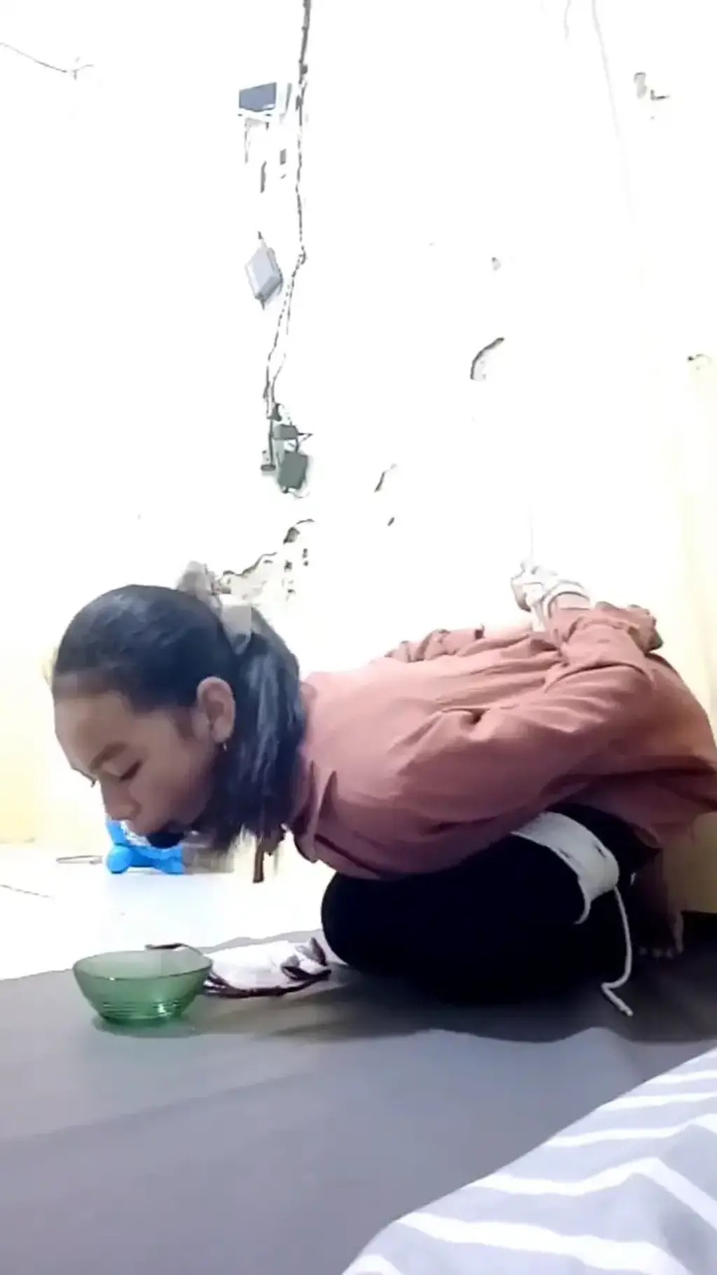 A Girl Tied Up In A Kneeling Position (ID-BOUND044) A Girl Tied In Kneeling Position with Mouth Attached Ballgag