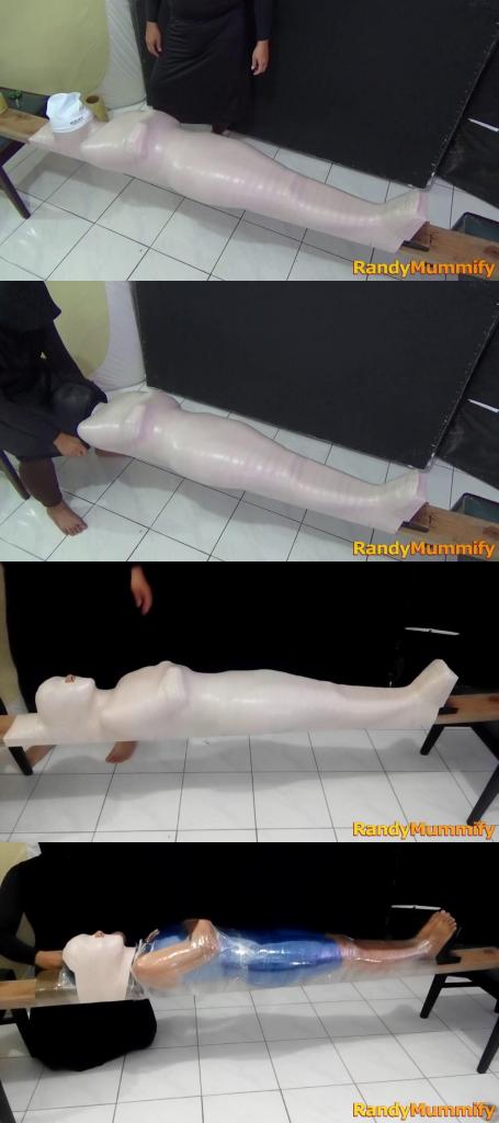 [RM129] Beautiful girl wrapped into wood tightly and face covered in swimcap A beautiful girl is mummified tightly on top of a stick.<br>The girls body was wrapped tightly so it was difficult to move. When the girls body was not holding onto her legs, her face was covered by the latex swim cap so that the girl could not breathe.
